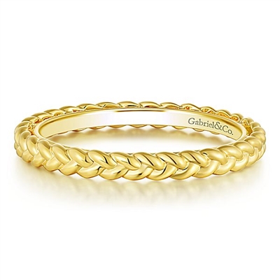 This stylish and simple 14k yellow gold stackable ring is twisted.