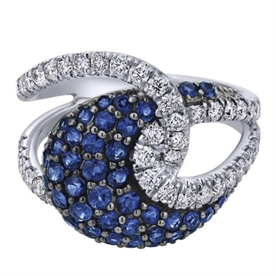 Sapphires and round diamonds intermingle in this fantastic and complex sapphire and diamond fashion ring.