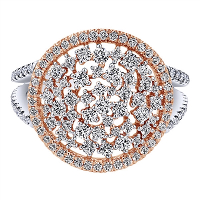 This funky diamond ring in 14k white and rose gold features one carat of diamond shimmer to match the fashion ring allure.