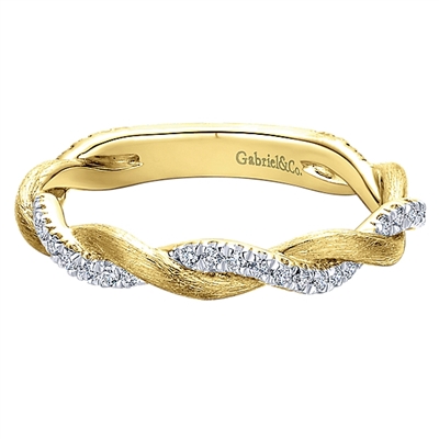 This unique 14k yellow gold diamond twist ring features 0.20 carats of diamonds.