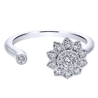 This uniquely styled open white gold fashion ring features nearly one third carats in round brilliant diamonds set in a white gold flower, all in 14k white gold.