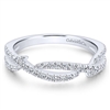 This twisted 14k white gold stackable ring features 0.31 carats of diamonds.