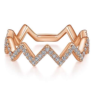 This 14k rose gold diamond stackable ring drips with diamonds.