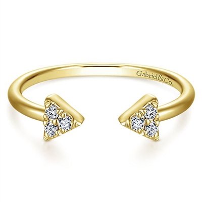 This 14k yellow gold diamond triangle stackable ring features diamond accents.