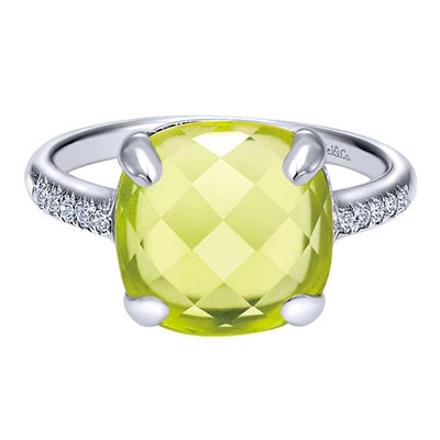 A nearly 6 carat lemon quartz stone sits in the center on a 14k white gold diamond accented band in this remade classic.