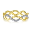 Diamonds shimmer in the center of this 14k yellow gold infinity swirl diamond ring.