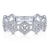 This 14k white gold diamond stackable ring features diamond hexagonal sections