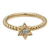 This 14k yellow gold ring features a diamond in the center of a star of david.