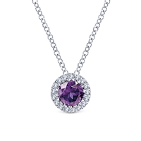 This 14k white gold purple amethyst and diamond necklace features .07 carats of diamonds.