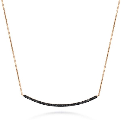 This 14k rose gold diamond bar necklace features 0.49 carats of black diamonds.