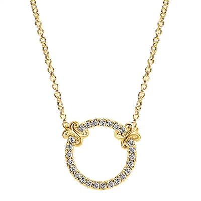 A circle of life studded with delicate diamonds all set in 14k yellow gold, grab yours today!