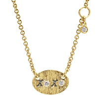 This simple xo necklace in 14k yellow gold is a cute accessory to any wardrobe, in 14k yellow gold.