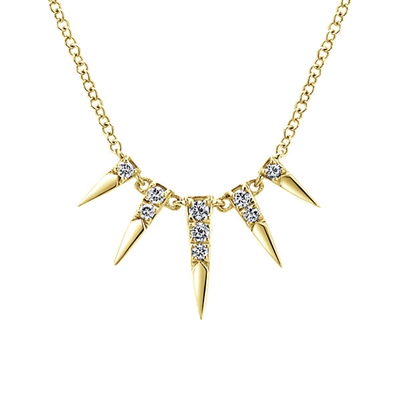 This 14k yellow gold diamond necklace features 0.13 carats of diamonds set into yellow gold with dangling sections.