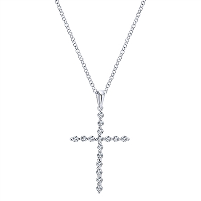 Shimmering diamonds fall down into 14k white gold in this stirring diamond cross necklace.