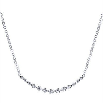 This 14k white gold diamond necklace with over one quarter carats of round diamonds create a simple yet elegant look by Gabriel & Co.