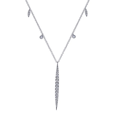 This beautifully draped diamond drop necklace with one half carats of round brilliant diamonds has white gold diamond tag accents and a funky and fresh look.