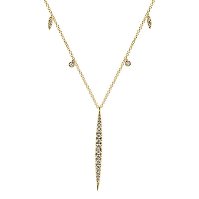 Round brilliant diamonds drip from this half station half pendant 14k yellow gold diamond necklace.