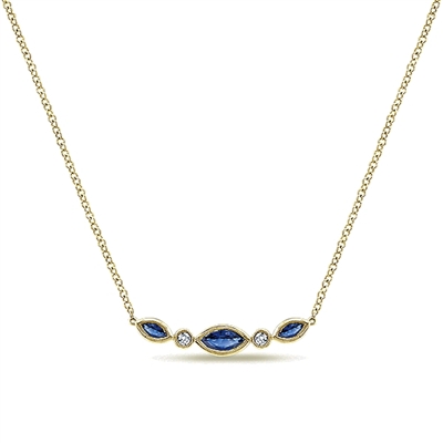 14k yellow gold serves as the canvas for this sapphire and diamond bar necklace with marquise sapphires and round diamond accents.