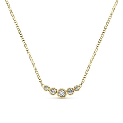 0.10 carats of round brilliant diamonds in a bar and bezel setting necklace.