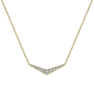 14k yellow gold serves as the setting for graduated round brilliant diamonds in this fanciful bar style necklace.