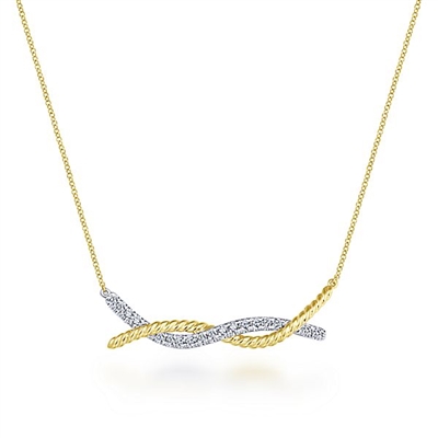 This twist bar necklace is in 14k gold and features diamonds.