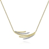 This 14k yellow gold diamond necklace features diamond accents.