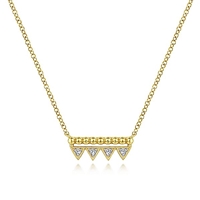 14k yellow gold beaded bar necklace features diamond accents.