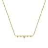 Diamonds shine in this 14k yellow gold bar necklace.