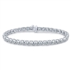 This classic diamond tennis bracelet in 14k white gold features 4 carats of round brilliant diamonds.