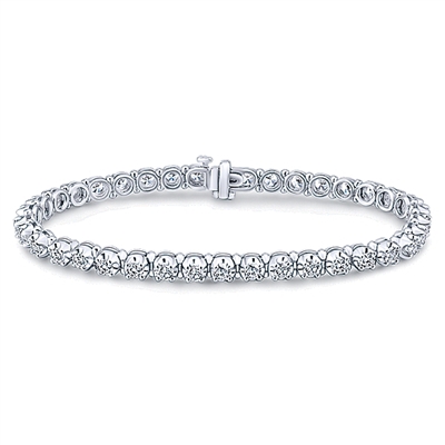 This classic diamond tennis bracelet in 14k white gold features 4 carats of round brilliant diamonds.