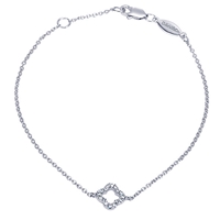 A delicate center diamond flower bracelet in 14k white gold!