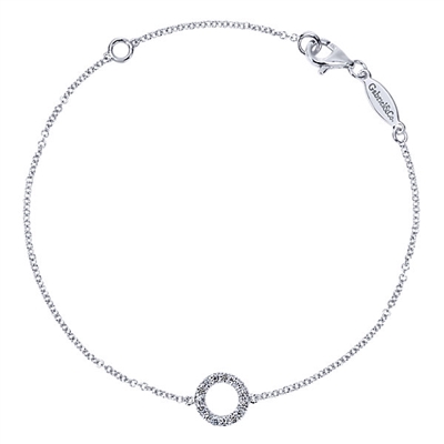 A singular diamond circle sits in the center of this 14k white gold diamond bracelet.