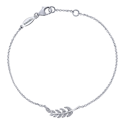 This diamond feather bracelet is a delicate and dazzling accessory in 14k white gold!