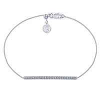 A 14k white gold diamond bar creates this tennis style bracelet.