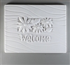 A rectangular tile made of white ceramic with a carved design. The center has a smaller rectangle filled with three daisy-like flowers and leaves. Below the flowers is curving text saying Welcome. The rest of the tile is filled with gentle waving lines.