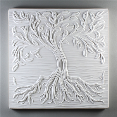 A large square tile made of white ceramic. The carved texture shows a large tree with its leaves taking up the top half and its roots occupying the bottom half. Behind the tree are a few barely raised lines as a simple background.