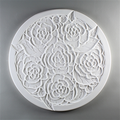 A circular tile made of white ceramic. The carved texture has the outline of six peony flowers with several leaves. There is a thin border containing most of the flowers and leaves, but the points of four longer leaves break through it.