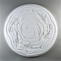A circular tile made of white ceramic. The carved texture has a top-down view of five koi fish swimming around the outside. There are gentle waving lines surrounding the fish and coming together in a loose spiral in the otherwise empty center.
