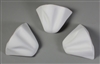 Three wedge-shaped ceramic molds for fusing glass on a grey background. Each wedge has a few gentle waves and ridges to give it texture like a large flower petal. They are arranged in a half circle with their points turned inward.