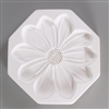 An octagonal, white ceramic mold for fusing hot glass on a grey background. A large, flat, detailed daisy flower with ten petals has been carved into it.