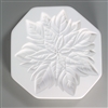 An octagonal, white ceramic mold for fusing hot glass on a grey background. A large detailed flat poinsettia flower has been carved into it.