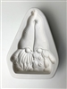 A triangular white ceramic mold for fusing hot glass on a grey background. Two gnomes leaning together have been carved into it. The left gnome has a beard and the right has pigtails. There is a post at top of their two hats to allow for hanging.