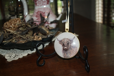 Heilan Coo medallion