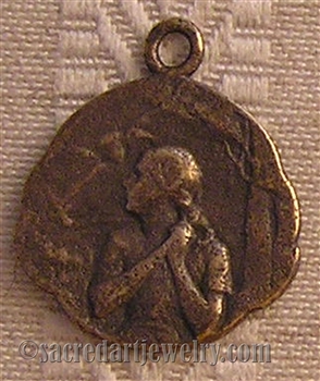 Joan of Arc Medal at the Stake 3/4" - Catholic religious medals in authentic antique and vintage styles with amazing detail. Large collection of heirloom pieces made by hand in California, US. Available in sterling silver and true bronze