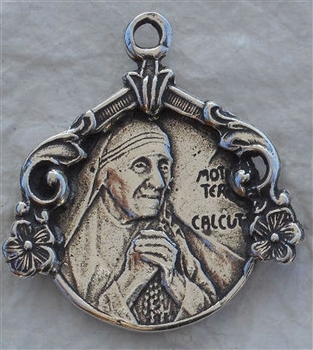 Mother Teresa Medal 15/16" - Catholic religious medals in authentic antique and vintage styles with amazing detail. Large collection of heirloom pieces made by hand in California, US. Available in true bronze and sterling silver