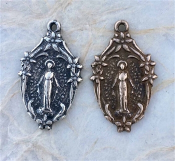 St. Anne of Beaupre with Infant, Jesus 1 1/8 - Catholic religious medals in authentic antique and vintage styles with amazing detail. Large collection of heirloom pieces made by hand in California, US. Available in sterling silver and true bronze