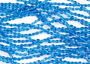 5x3mm Czech Glass Pinch Spacer Beads - Transparent Capri Blue