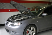 Redline Tuning Hood QuickLift: Mazda 3 Sedan