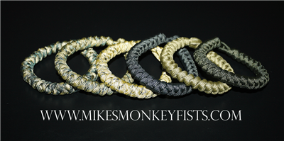 Paracord Survival Bracelets Snake Weave, Black, Olive Drab, Coyote Brown, Desert Camo, Woodland Camo, and MultiCam.