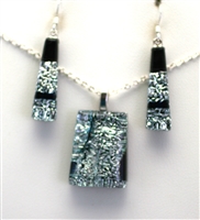 Hawaii fused glass jewelry.  Handmade on Maui. Pendant and Earrings. Silver sparkle on black glass.